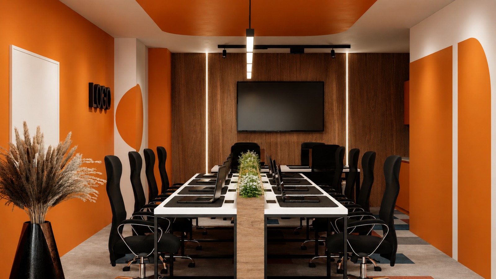 Fluid training room at PRN CO-WORK with long table, wall screen and orange interior